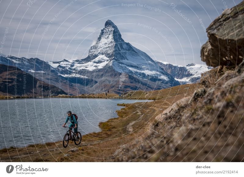 MTB in front of the Matterhorn Sports Fitness Sports Training Cycling Mountain bike Feminine Body 1 Human being Environment Nature Plant Elements Earth Water