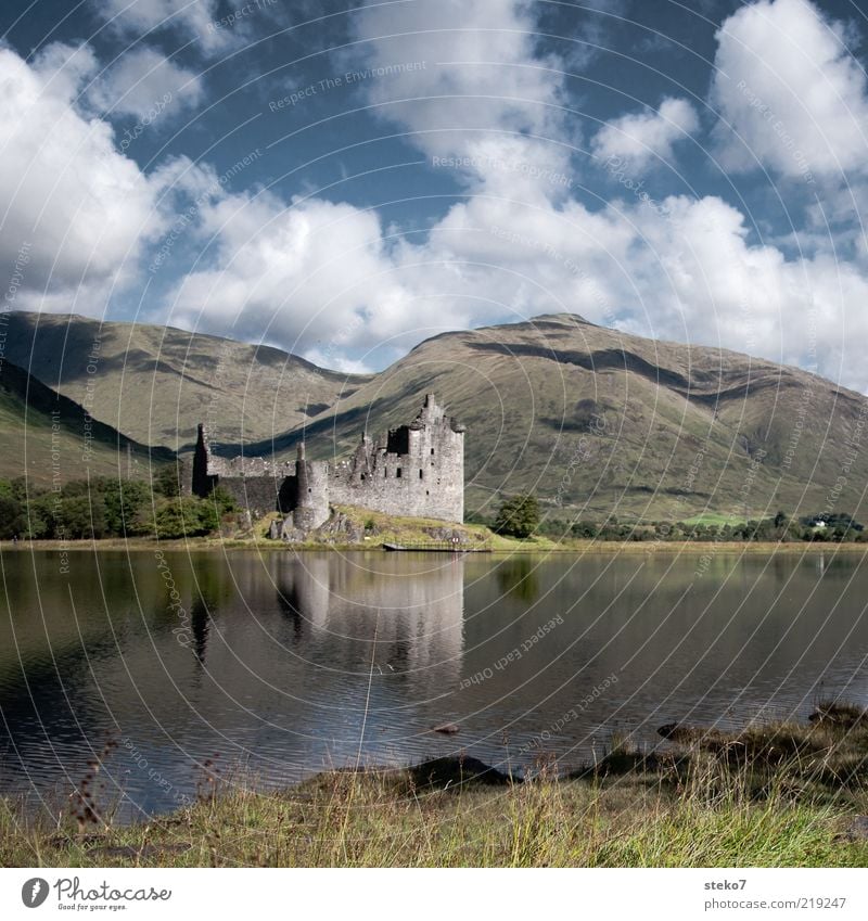 the roof was on fire Clouds Mountain Lakeside Ruin Loneliness Transience Scotland Kilchurn Castle Derelict Highlands Colour photo Exterior shot Deserted