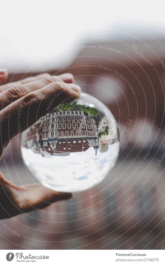 Upside down (01) Town House (Residential Structure) Living or residing Glass ball On the head Hand To hold on Reflection Clouds Apartment Building Colour photo