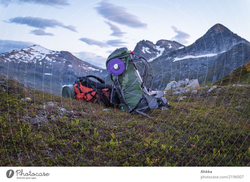 Two hiking backpacks in front of an evening mountain panorama Harmonious Well-being Contentment Senses Relaxation Calm Meditation Vacation & Travel Adventure