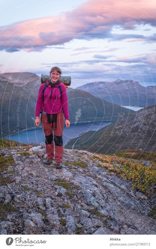 Young woman in front of Norwegian evening scenery Vacation & Travel Trip Adventure Hiking Youth (Young adults) Landscape Clouds Mountain Fjord Norway Lofotes