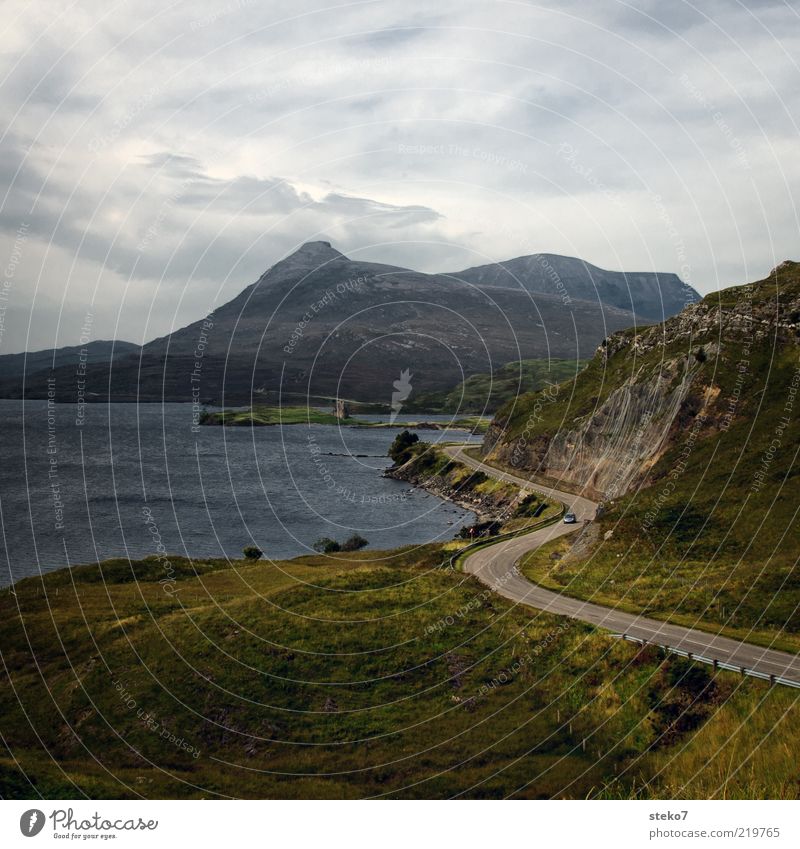 no picture of Scotland without ruins Mountain Peak Lakeside Ruin Coastal road Car Loneliness Freedom Vacation & Travel Curve Colour photo Copy Space top Castle