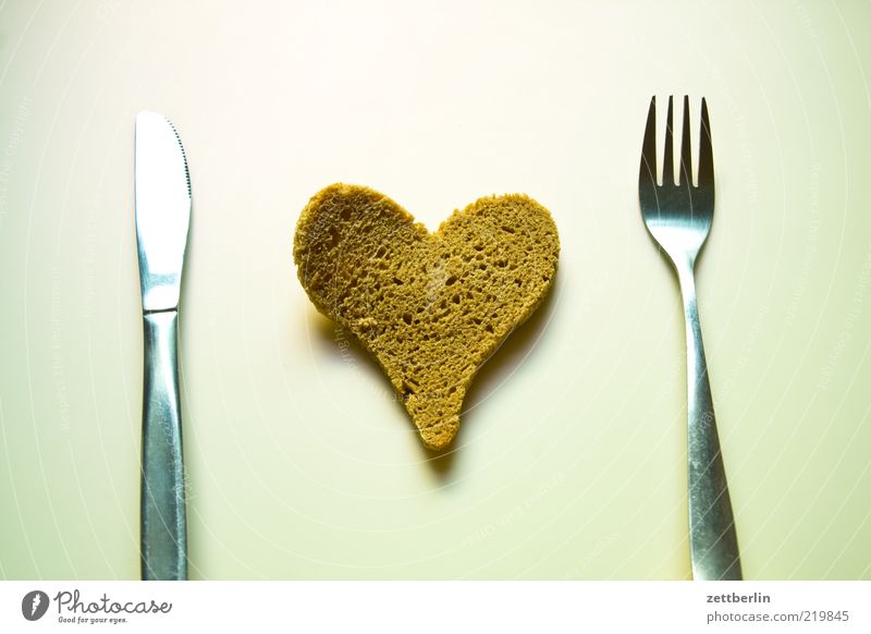 knife, bread, fork Food Bread Nutrition Cutlery Knives Fork Sign Heart Happy Emotions Dry Structures and shapes Interior shot Close-up Detail Deserted