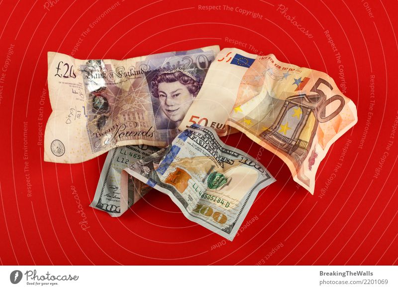 Rumpled banknotes of Euro, Dollars and Pound over red Economy Trade Craft (trade) Financial institution Business Money Paying Shopping Save Throw Red Dangerous