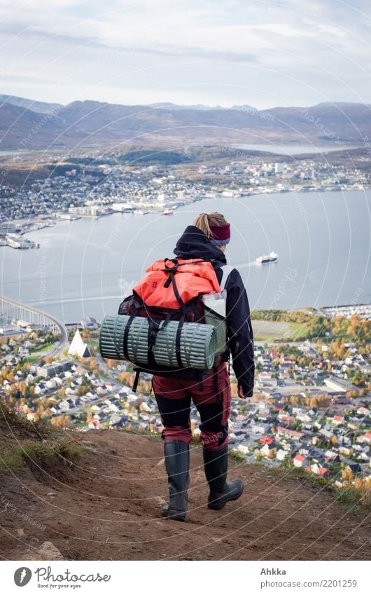 Young woman on her way to Tromsø Vacation & Travel Far-off places Hiking Youth (Young adults) Life Mountain Fjord Port City Downtown Discover Natural Uniqueness