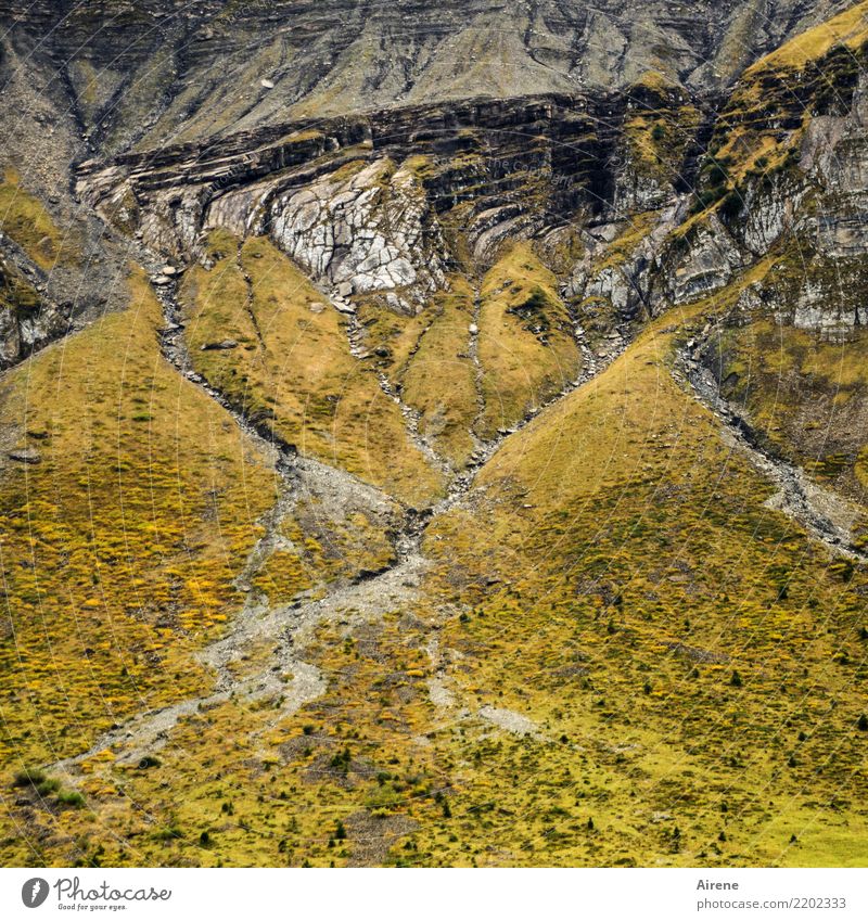 pretty old hard drive stacked (n) Nature Landscape Rock Mountain Erosion Threat Firm Gigantic Tall Yellow Gray Fear Timidity Concern Environment Destruction