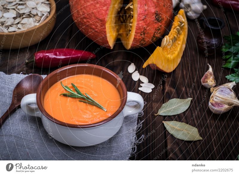 pumpkin soup Vegetable Soup Stew Herbs and spices Eating Lunch Dinner Organic produce Vegetarian diet Diet Bowl Spoon Decoration Table Hallowe'en Nature Autumn