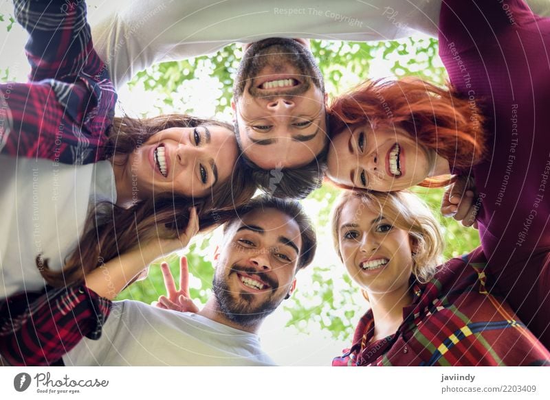 Group of young people together outdoors in urban background. Lifestyle Joy Happy Beautiful Woman Adults Man Friendship Autumn Street Clothing Smiling Laughter