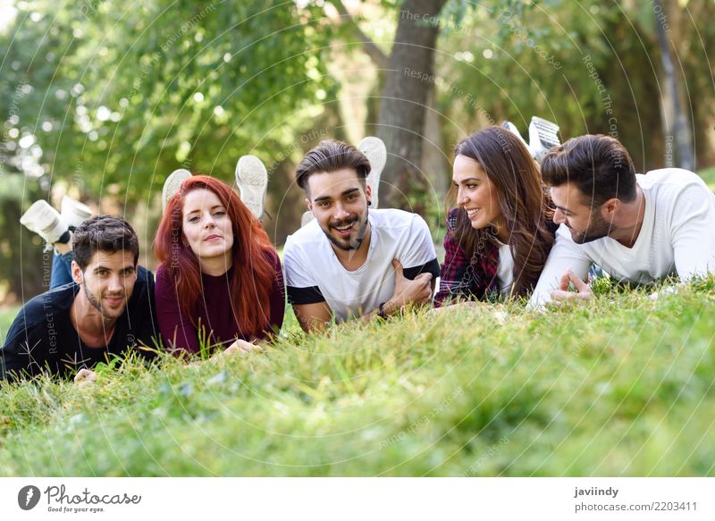 Group of young people together outdoors in urban park Lifestyle Joy Happy Beautiful Woman Adults Man Friendship Spring Summer Autumn Street Smiling Laughter