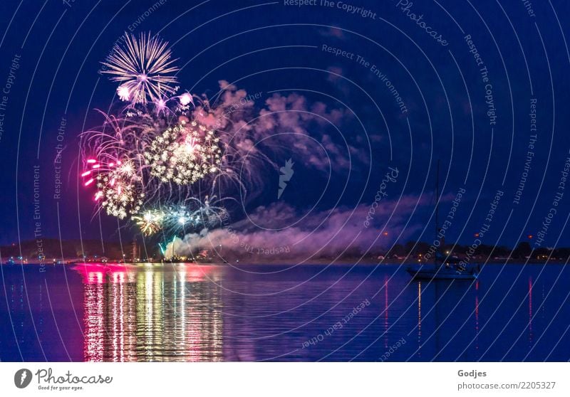 Fireworks on the shore with reflection and ship on the water Natur Wasser Himmel Nachthimmel Horizont Sommer Baum Küste Vorpommersche Boddenlandschaft