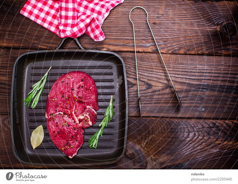 Fresh raw diced red beef meat (chopped in cubes) in a styrofoam container  with copy space for text. Weighing diced meat on scales Stock Photo - Alamy