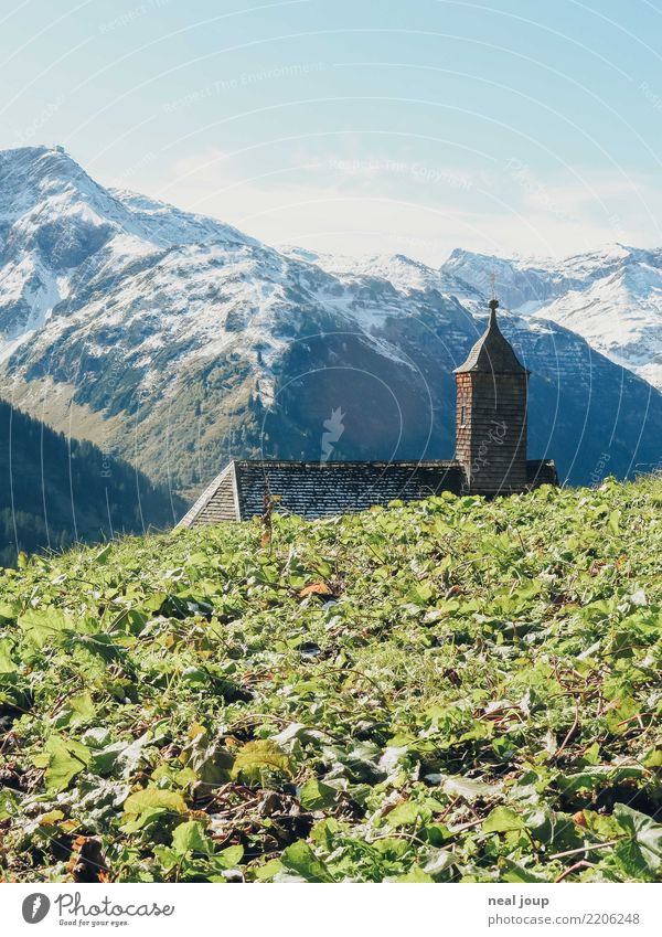 Chapel with view Landscape Horizon Mountain Snowcapped peak Austria Roof Tower Crucifix Discover Hiking Simple Historic Tall Small Cliche Blue Green Virtuous