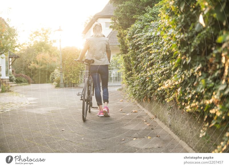 Woman push hot sale bike