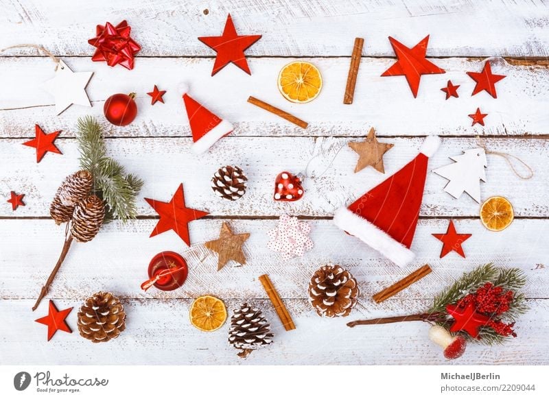 Christmas Elements of Decoration and Food Winter Christmas & Advent Red White Chaos Arranged Grunge Eating Candy Cinnamon Cap Background picture flatlay