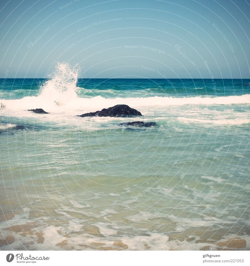 splish splash Environment Nature Elements Water Sky Cloudless sky Horizon Beautiful weather Waves Ocean Blue Pure Natural phenomenon Stone Rock White crest