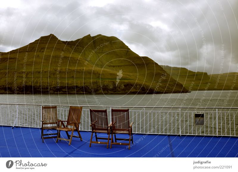 Faroe Islands Vacation & Travel Tourism Far-off places Cruise Ocean Chair Environment Nature Landscape Water Sky Clouds Climate Bad weather Rock Mountain