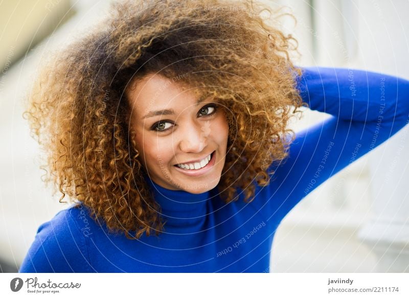 Young woman smiling with afro hairstyle and green eyes Elegant Style Beautiful Hair and hairstyles Face Human being Woman Adults Autumn Fashion Afro Smiling