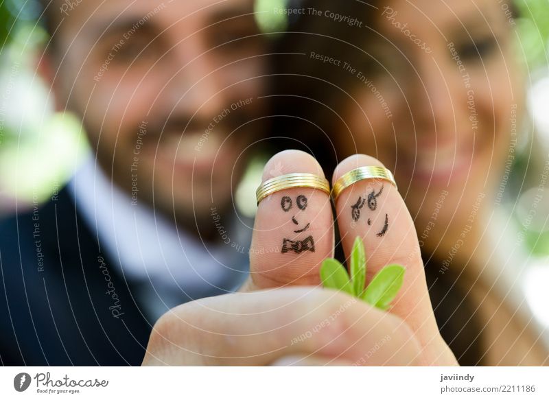 wedding rings on their fingers painted with the bride and groom, Beautiful Feasts & Celebrations Wedding Human being Woman Adults Man Couple Fingers