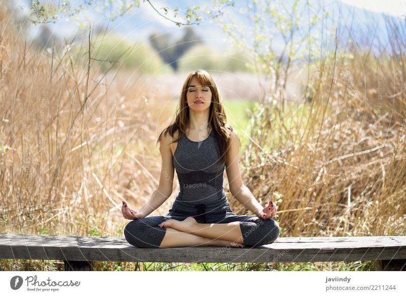 Young woman doing yoga in nature. Lifestyle Beautiful Body Relaxation Meditation Summer Sports Yoga Human being Feminine Youth (Young adults) Woman Adults 1