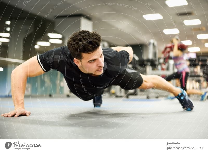 Attractive man doing pushups in the gym Lifestyle Beautiful Body Sports Human being Masculine Man Adults 1 18 - 30 years Youth (Young adults) Fitness Thin