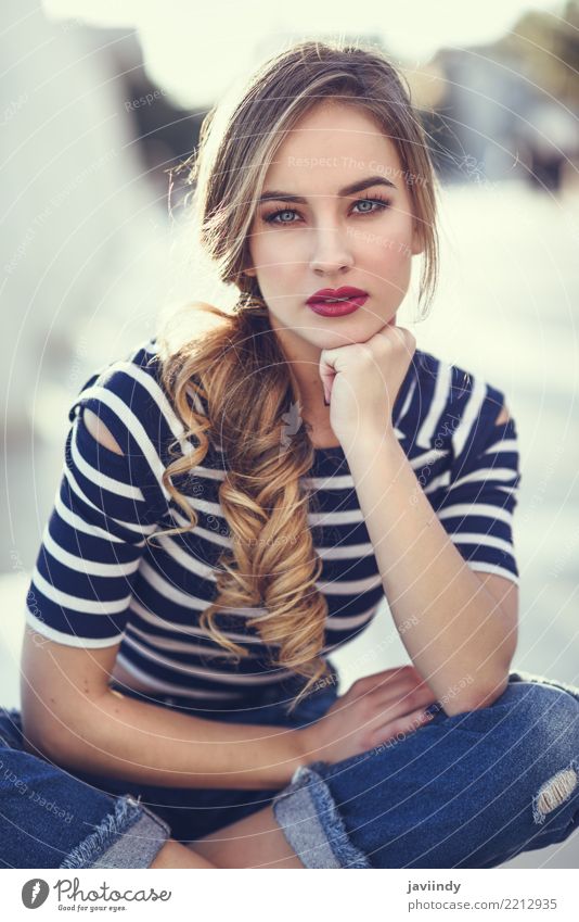 Blonde woman, model of fashion, sitting on a bench in urban background. Lifestyle Happy Beautiful Hair and hairstyles Summer Human being Woman Adults Street