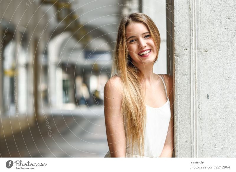 Young Woman In Stylish Clothes Against The Background Of The City, Romantic  Portrait. Portrait Of The Charming Blonde On The Street. Stock Photo,  Picture and Royalty Free Image. Image 77316524.