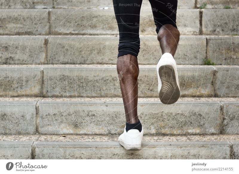 Muscular legs of athletic young man - Stock Image - P701/0062 - Science  Photo Library