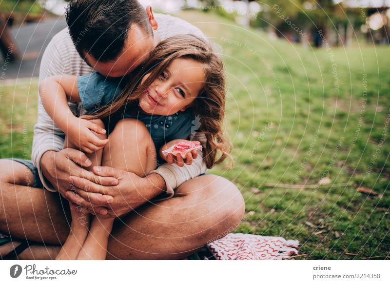 Father and daughter at a picnic in the park Eating Lifestyle Joy Happy Garden Parenting Child Human being Girl Parents Adults Family & Relations Infancy 2