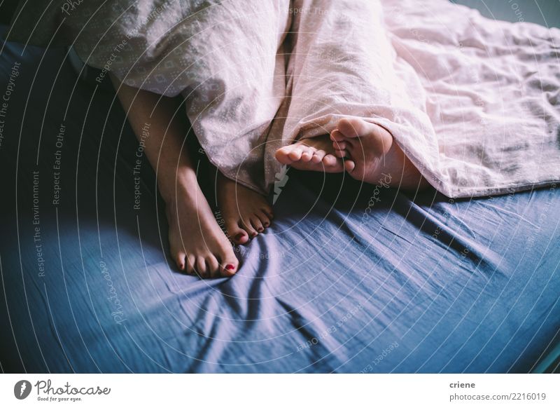 Close-up of couple cuddle in the bed Pedicure Relaxation House (Residential Structure) Bedroom Human being Woman Adults Man Couple Feet Love Embrace Together