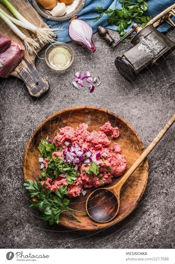 Raw minced meat,in bowl with spoon Food Meat Herbs and spices Nutrition Organic produce Crockery Plate Bowl Spoon Design Healthy Eating Table Kitchen