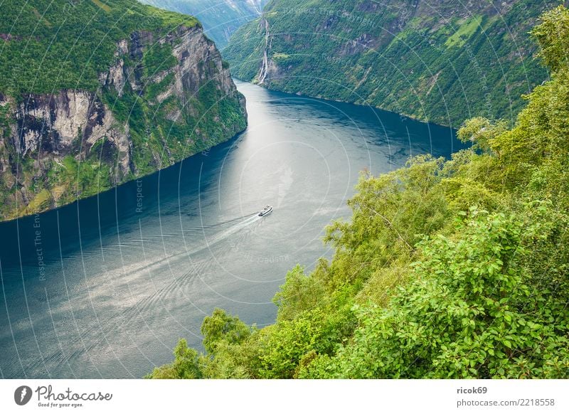 View of the Geirangerfjord in Norway Relaxation Vacation & Travel Tourism Cruise Mountain Nature Landscape Water Tree Rock Fjord Tourist Attraction Ferry Idyll