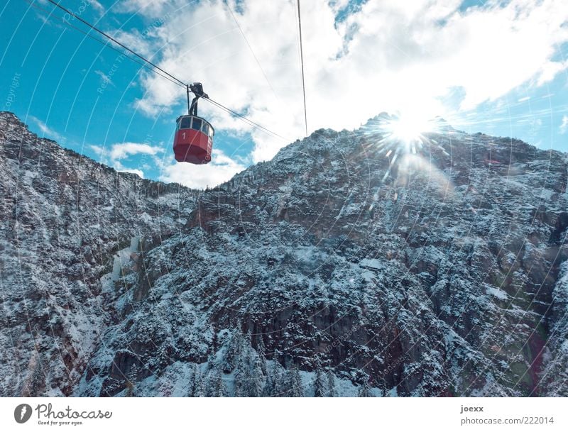 vintage car Sky Clouds Sun Sunlight Winter Beautiful weather Snow Alps Mountain Peak Cable car Old Esthetic Gigantic Large Historic Tall Cold Blue Red White