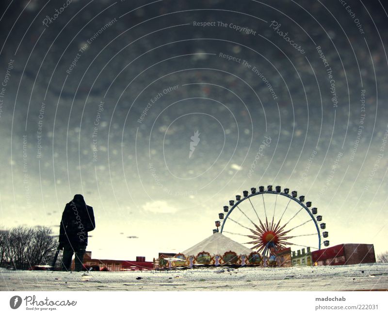 Silhouette of a man in lockdown in front of the Ferris wheel - melancholy Lifestyle Entertainment Fairs & Carnivals Masculine Man Adults Environment Water