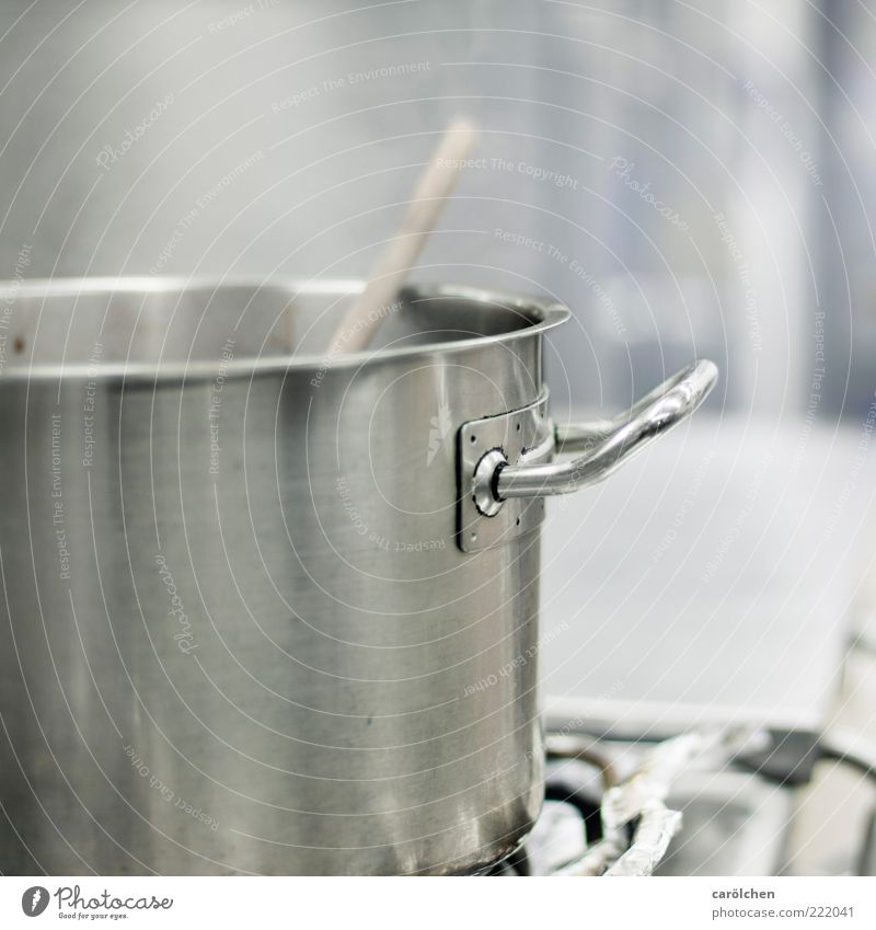 Royalty-Free photo: Boiling water on gray stainless steel cooking pot