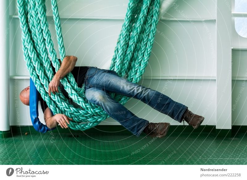 Hanging tired on the ropes Lifestyle Relaxation Human being Masculine Man Adults Navigation Passenger ship Rope On board Jeans Hiking boots Bald or shaved head