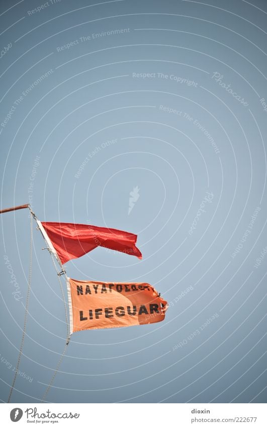 LIFEGUAR(D) Sky Cloudless sky Wind Gale Flag Red Lifeguard Rescue Warning label Blow Judder Bans Danger of Life Colour photo Exterior shot Deserted