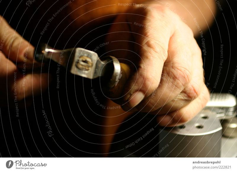 engraving Craftsperson Human being Masculine Hand Fingers 1 Dark Colour photo Interior shot Close-up Artificial light Shadow Contrast Shallow depth of field