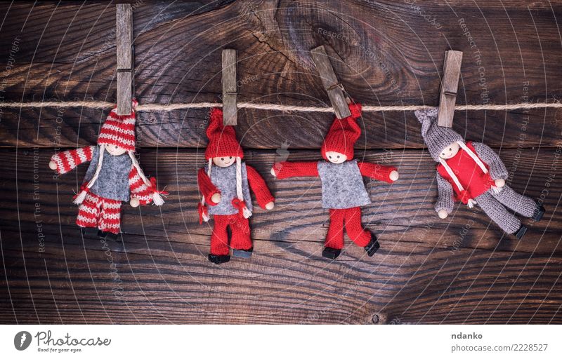 wooden dolls in winter clothes Christmas & Advent New Year's Eve Rope Toys Doll Wood Small Brown Red Hanging Clothes peg christmas background vintage Rustic