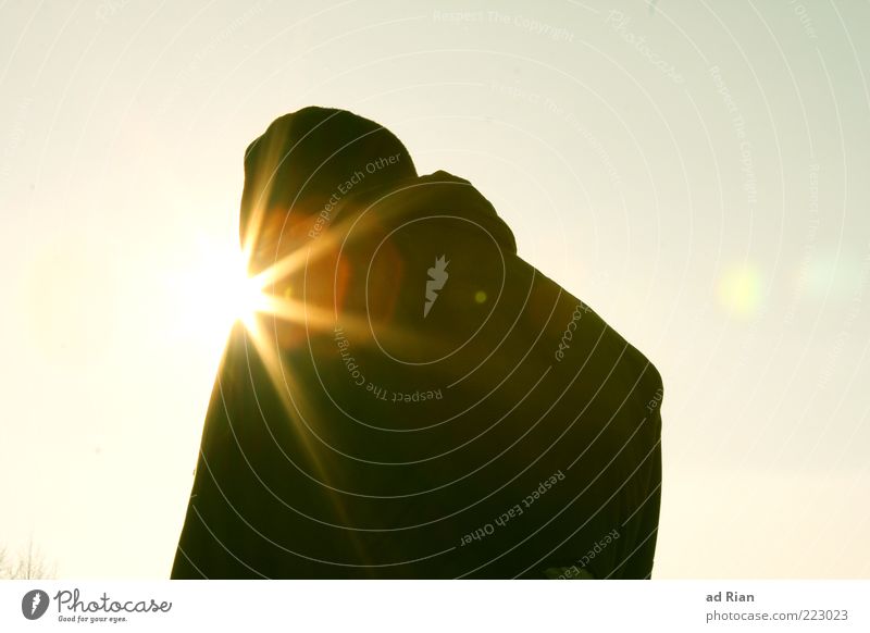 the sun is shining out of his... um. Mouth! Human being Back 1 Cloudless sky Sun Cold Colour photo Sunlight Sunbeam Worm's-eye view Silhouette Rear view Cap