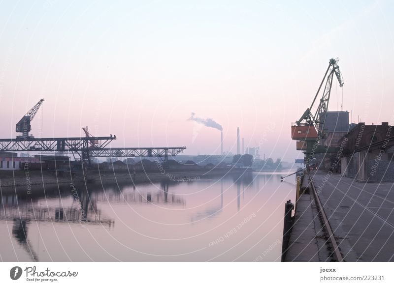 Pastel evening atmosphere at the harbor basin with cargo cranes Harbour rhine harbour Sky Cloudless sky River bank Old Blue Gray Pink Red Calm Break Karlsruhe