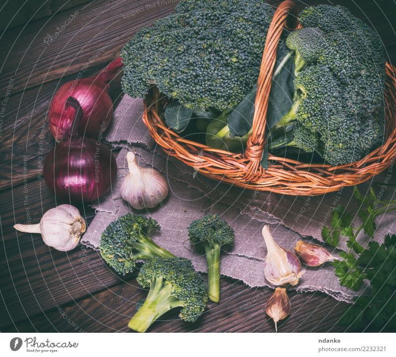 fresh broccoli in a brown wicker basket Vegetable Nutrition Eating Vegetarian diet Diet Table Wood Fresh Natural Brown Green Rustic Ingredients Cooking dieting