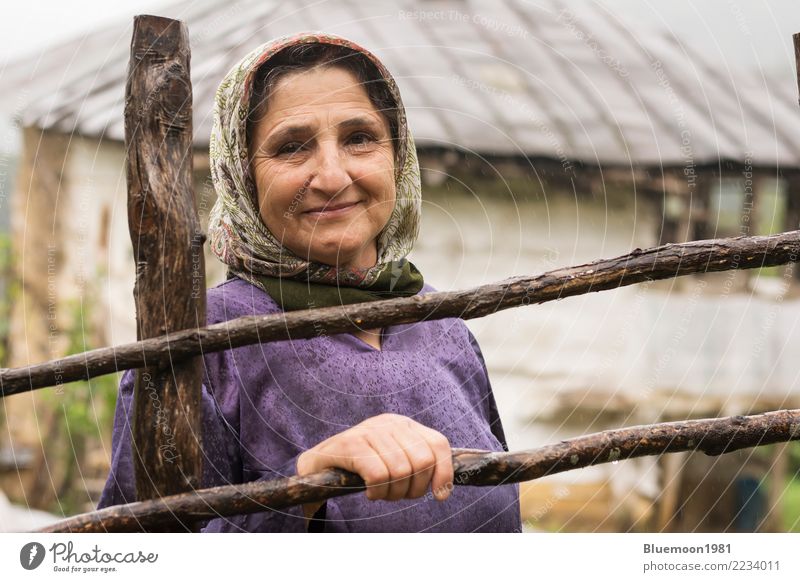 Portrait of an elderly Muslim woman in rainy day, rural area Lifestyle Style Vacation & Travel House (Residential Structure) Human being Feminine Woman Adults