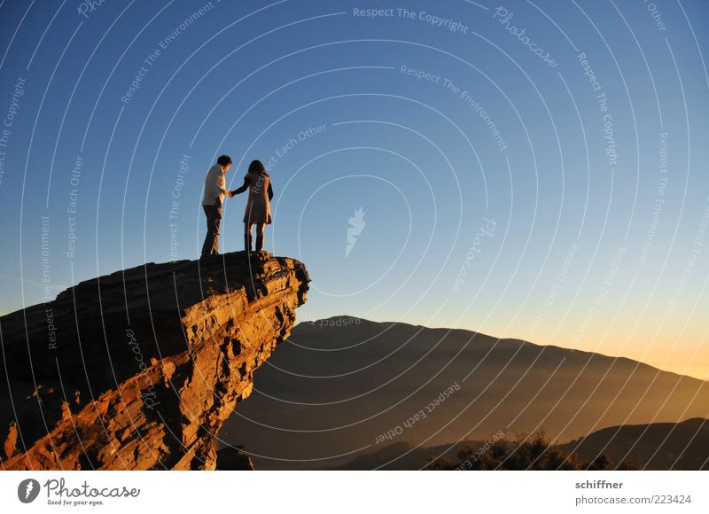 Love, profound Human being Couple Partner 2 Nature Elements Sky Cloudless sky Beautiful weather Rock Mountain Discover Stand Bravery Passion Trust Protection
