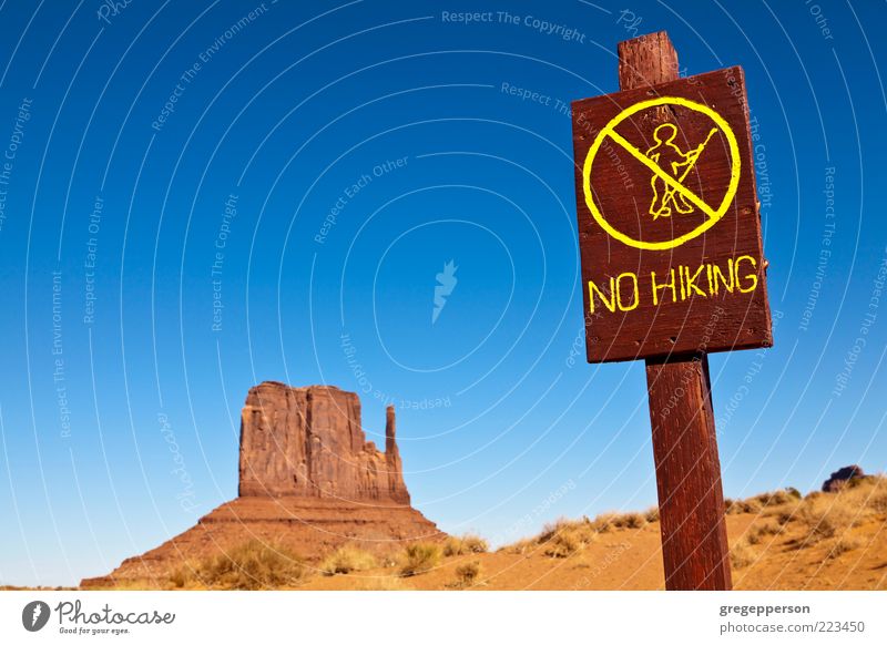 No hiking sign. Adventure Hiking Environment Nature Landscape Desert Sign Walking Advice Risk Bans Warning sign Wilderness Colour photo Exterior shot Deserted