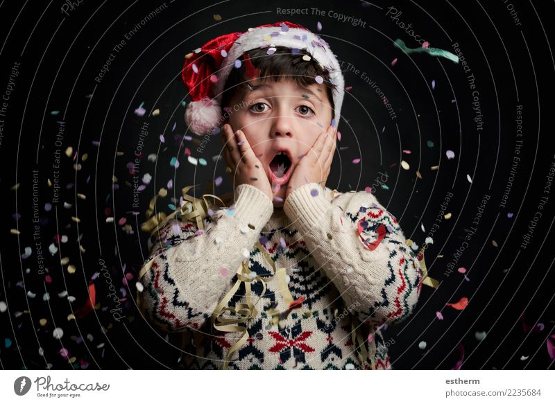 surprised child in New Year's Eve on black background Lifestyle Joy Party Event Feasts & Celebrations Christmas & Advent Human being Masculine Child Toddler