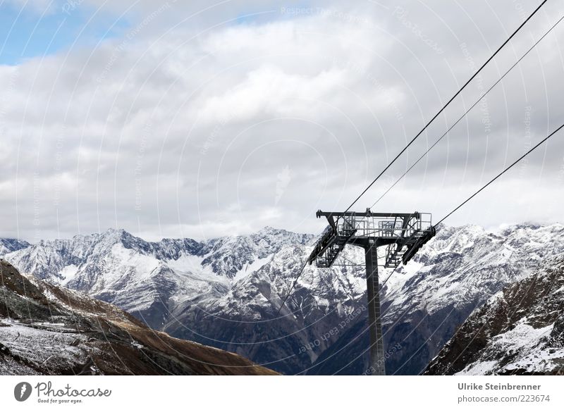 View of the Ötztal mountains from the Rettenbach glacier with ski lift mast Winter Mountain Clouds Rock Alps Glacier Passenger traffic Cable car Ski lift Cold