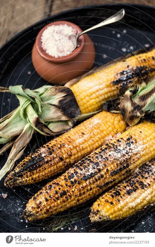 Roasted corn salted. Vegetable Nutrition Vegetarian diet Summer Wood Hot Yellow White BBQ roasted food cob background Snack Vantage point Organic Rustic Top