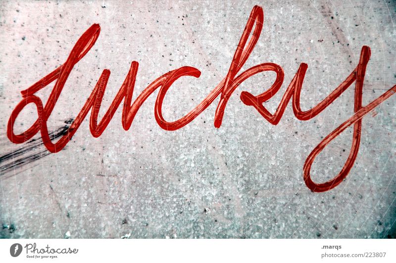Lucky Lifestyle Style Wall (barrier) Wall (building) Concrete Sign Characters Graffiti Write Cool (slang) Dirty Hip & trendy Uniqueness Gray Red Happy