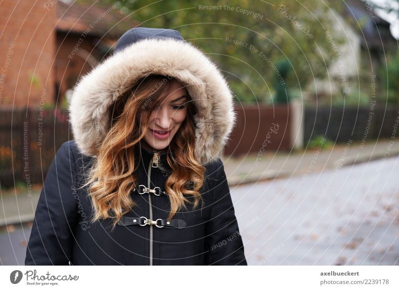 young woman wearing hooded winter coat playing coy Lifestyle Winter Human being Feminine Young woman Youth (Young adults) Woman Adults 1 18 - 30 years Village