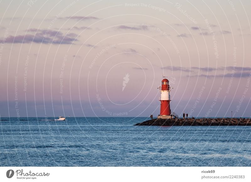 Mole at the Baltic Sea coast in Warnemünde Relaxation Vacation & Travel Tourism Ocean Nature Landscape Water Clouds Coast Lighthouse Architecture